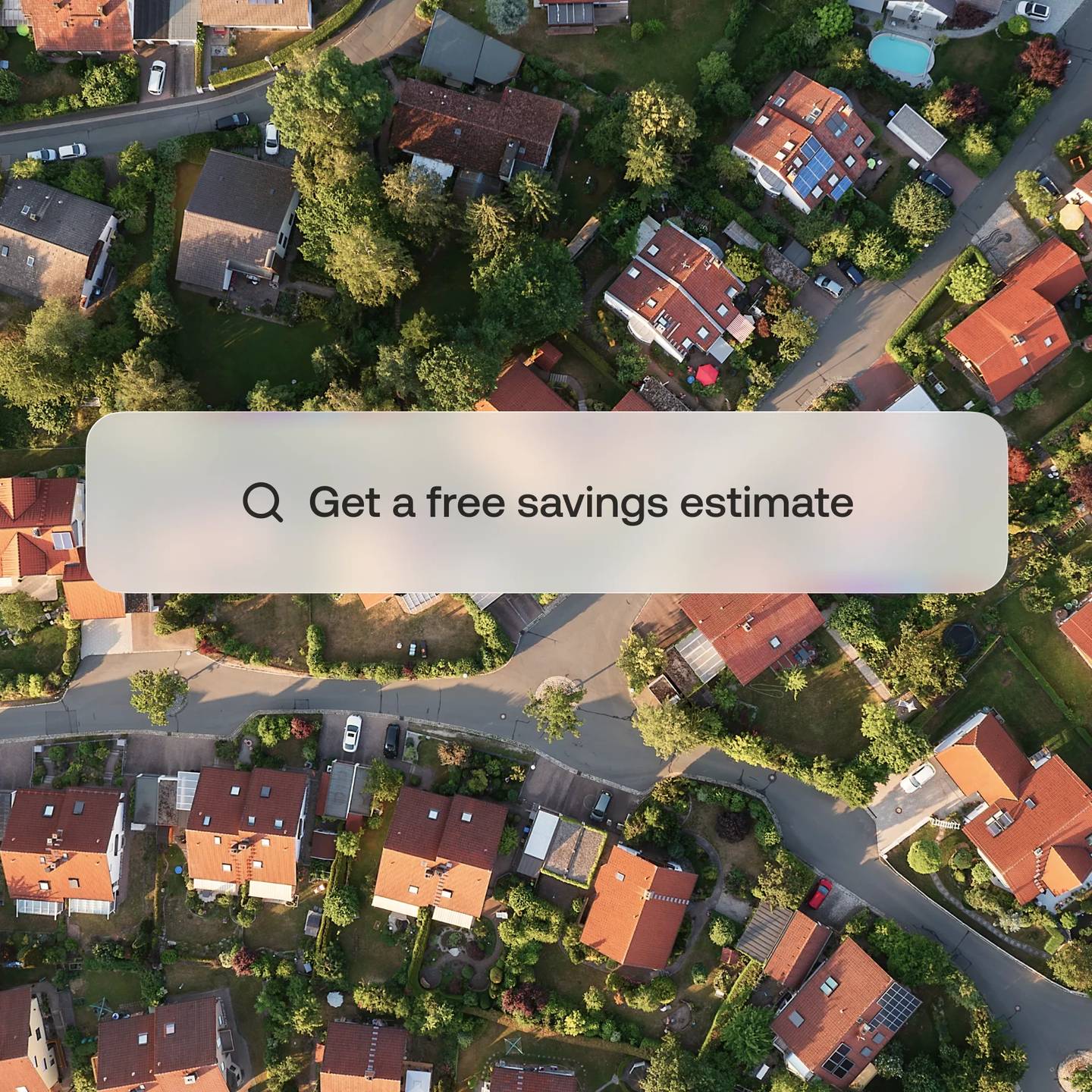 Aerial view of a neighbourhood with a free savings estimate search field.
